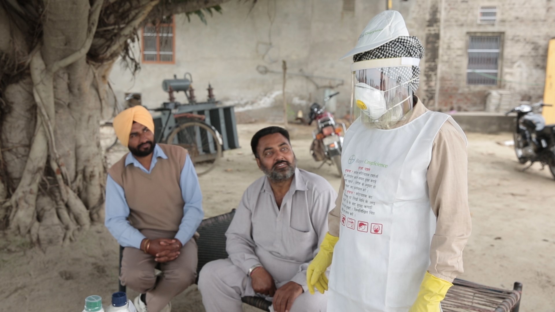 Appropriate PPE being demonstrated to farmers in India by Bayer CropScience (ECCHR, 2015)