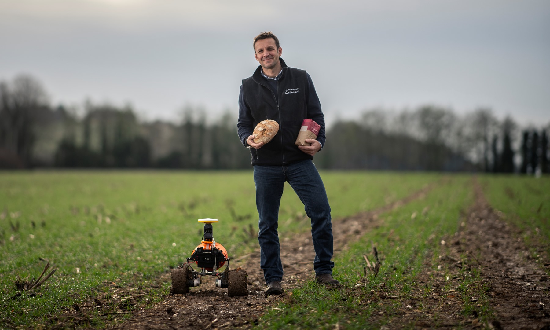 Small Robot Company Andrew Hoad, Partner & Head of the Leckford Estate, Waitrose & Partners, with Tom monitoring robot prototype (credit Geoff Pugh)